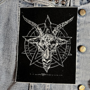 May include: Black and white patch featuring a goat's head within a pentagram. The pentagram is encircled by a circle with the words "SOLVE COAGULA" inscribed around it. The words "LEWIS MAYHEM" are written beneath the pentagram.
