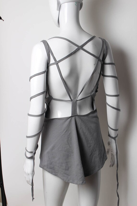 Open shoulder peek tunic