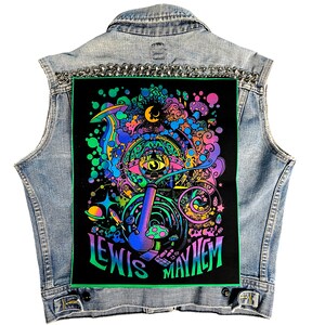 May include: A black denim vest with a colorful psychedelic patch featuring a large eye, a pipe, and the text "Lewis Mayhem".