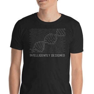 May include: Black t-shirt with a white design of a series of 1s and 0s, representing binary code. The text "Intelligently Designed" is printed below the code.