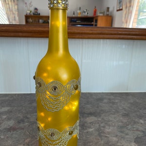 Metallic Gold and Silver Metallic Lace  Decorated Wine Bottle Set