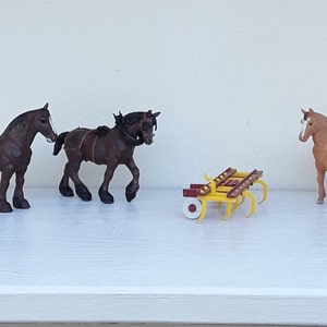 Vintage Britains Ltd, die cast farm toy cultivator plus 3 Britains Shire horses. Vintage, traditional toy farm animals and farm equipment.
