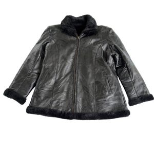 Veste vintage réversible en patchwork de cuir et fausse fourrure noire, style années 90 (Y2K).