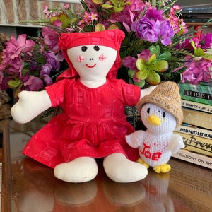 Vintage Rag Doll and Hand-Knitted Duck: Retro Nursery Display