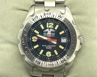 Rare montre vintage Mil Eagle de style militaire : design américain et mouvement suisse
