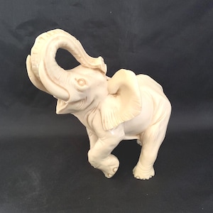 Vintage Resin Elephant Figurine: Collectible Home Decor