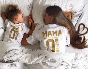 matching mother and newborn daughter outfits