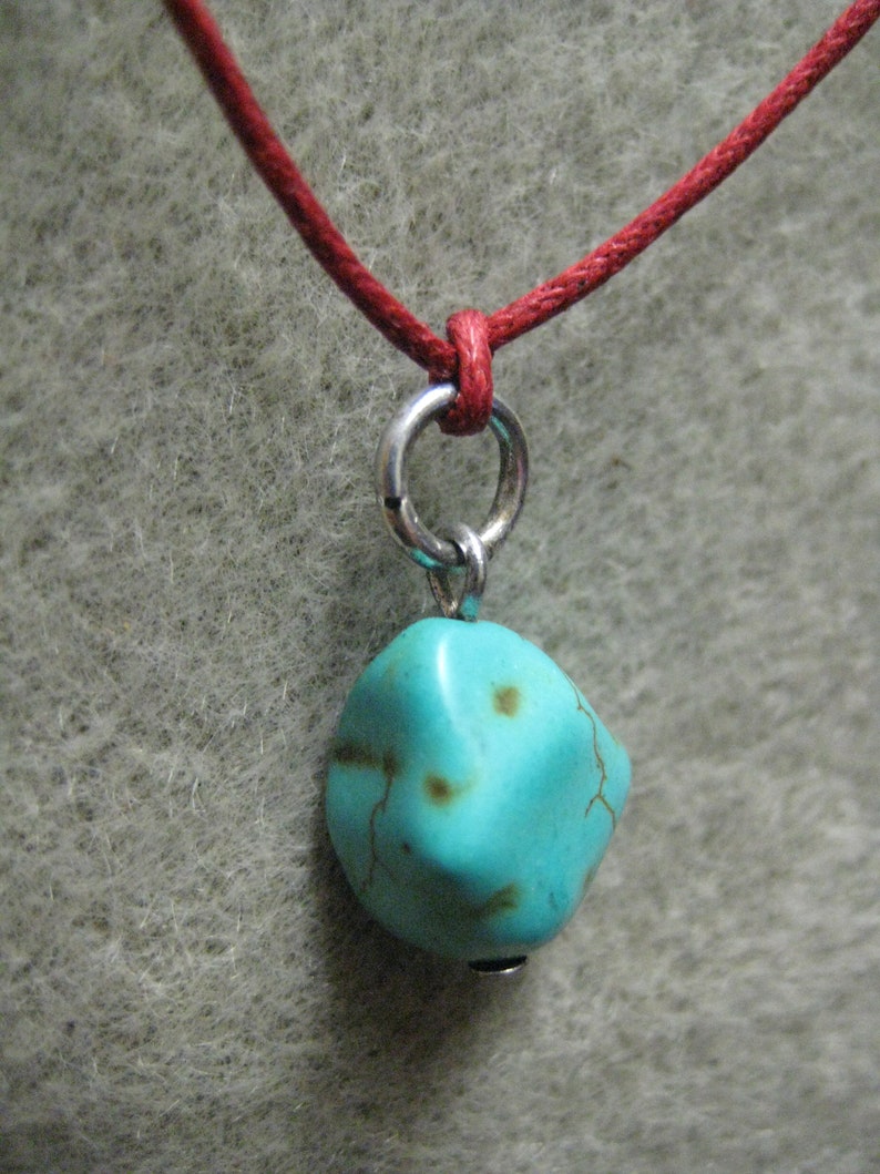 Turquoise pendant on adjustable red cord gifts for girls or boys surfing skating or hiking these will last a long time