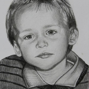May include: A black and white pencil drawing of a young boy with short hair wearing a striped shirt. The boy is looking directly at the viewer with a serious expression.