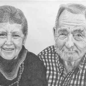 May include: A black and white pencil drawing of an older couple. The woman is wearing a dark sweater and a necklace. The man is wearing a plaid shirt. They are both smiling.