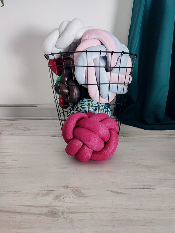 Pink knot pillow hotsell