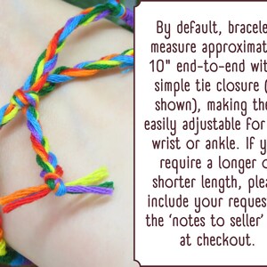 May include: A braided rainbow-colored string bracelet featuring a tie closure. The text in the image states: By default, bracelets measure approximately 10" end-to-end with a simple tie closure (as shown), making them easily adjustable for any wrist or ankle.