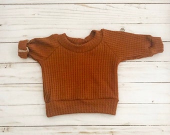 rust baby romper
