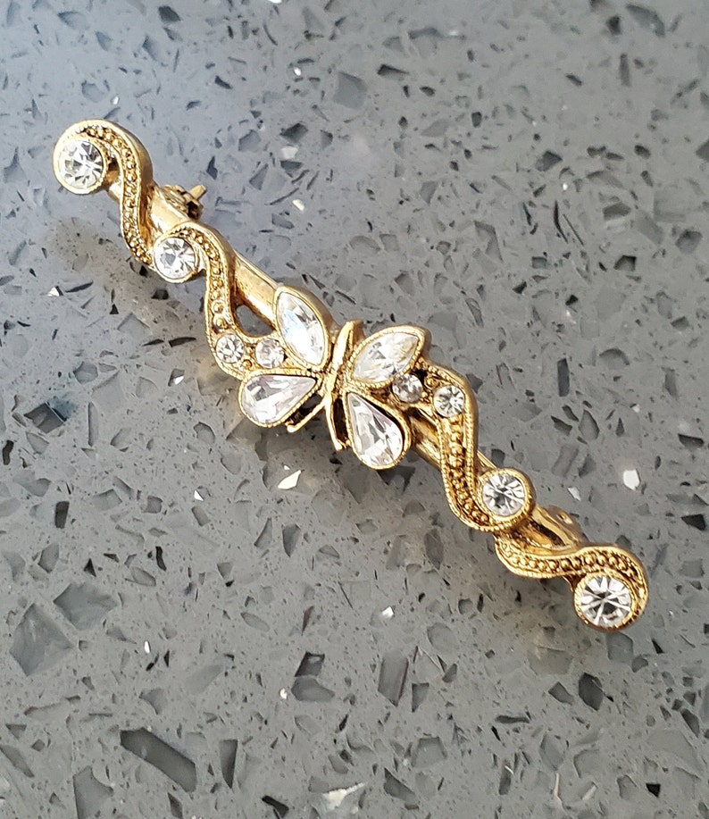 Signed 1928 Goldtone Rhinestone Butterfly Bar Brooch Pin