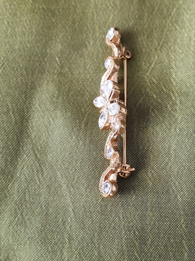 Signed 1928 Goldtone Rhinestone Butterfly Bar Brooch Pin