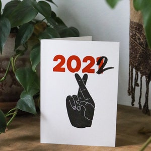 Fingers Crossed 2022 Good Luck Funny Happy New Year Political COVID-19 Letterpress Card image 1