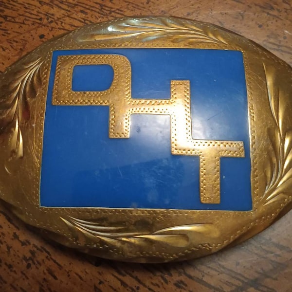 Vintage 1980's Danny Harman Trucking Brass and Enamel belt buckle. This item measures  about 4.5 by 3 inches. Sales to USA only!