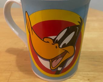 Vintage Daffy Duck Coffee mug. Rare Loony Tunes. The mug is in excellent condition. No chips, cracks, or breaks. Vintage and cool. L@@K!