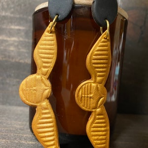 Golden snitch earrings