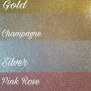 May include: Four swatches of glitter in different colours: gold, champagne, silver, and pink rose.