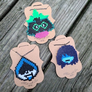 D E L T A R U N E Themed Pixel Necklaces