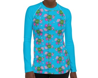 Camiseta de protección solar para mujer con estampado floral tropical azul