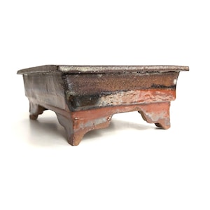 Hand built rectangular bonsai pot, liquidy red and earthy brown glazing, dark stoneware