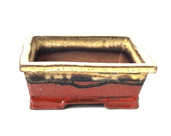 Square, earthy red and yellow ochre hand built bonsai pot, dark stoneware