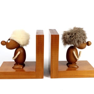 Serre-livres optimistes et pessimistes par Hans Bolling