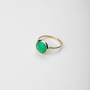 Natural green gemstone ring in 14K yellow gold with a round chrysoprase stone.