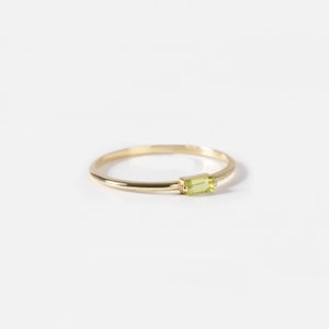 14K gold Peridot ring for women in minimalist design. The ring is ideal for a birthday gift for girlfriend as peridot is the August birthstone.