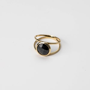 Modern ring for women made of 14K solid yellow gold and natural round black onyx gemstone