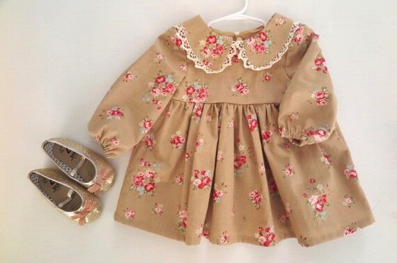 Soft Brown, rosy Winter baby dress, with long sleeves Size 3-6 months Last one. Soft Brown, rosy Winter baby dress, with long sleeves Size 3-6 months Last one.