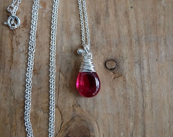 Red Rubellite drop necklace, a sterling silver chain necklace with spring clasp and a red gemstone. Valentines day jewelry.