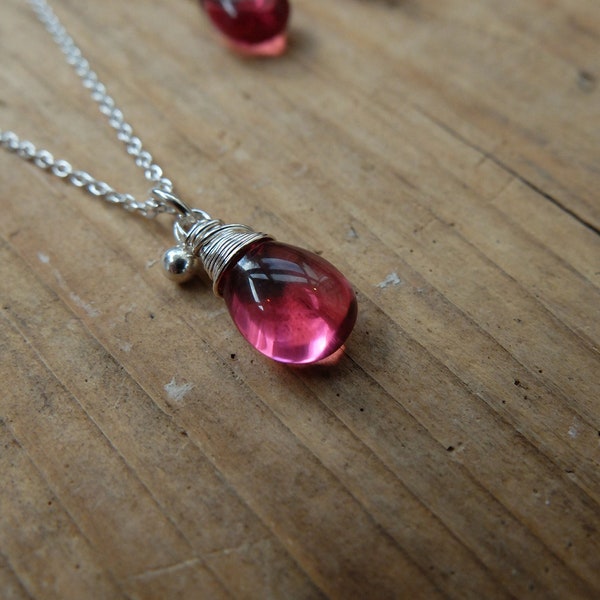 Pink Rubellite drop necklace, a sterling silver chain necklace with spring clasp and a bright pink rubellite gemstone. Christmas gift idea.
