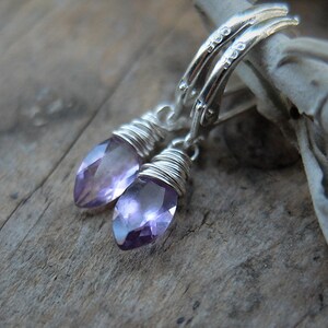 Amethyst drop & dangle earrings, beautifully shaped facetted Amethyst stones, finished with sterling silver, leverbacks.