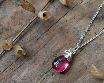 Pink Rubellite drop necklace, a sterling silver chain necklace with spring clasp and a bright pink rubellite gemstone. Christmas gift idea.