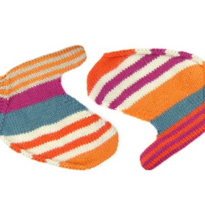 May include: A pair of colorful striped knitted mittens. The mittens are made with orange, pink, white, and blue yarn.