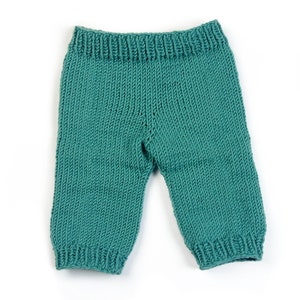 Puede incluir: Pantalones de beb&eacute; de punto de color verde azulado con textura acanalada.
