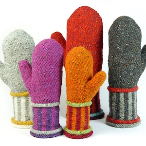 May include: Five pairs of knitted mittens in various colors, including gray, pink, orange, and red. Each pair has a striped cuff in a contrasting color.