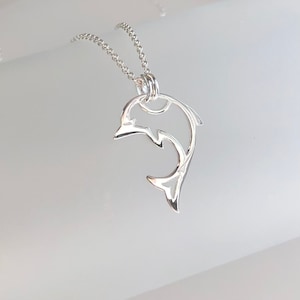 Sterling silver dolphin necklace, whimsical dolphin pendant, dolphin outline charm, ocean aquatic marine necklace, dolphin lover necklace