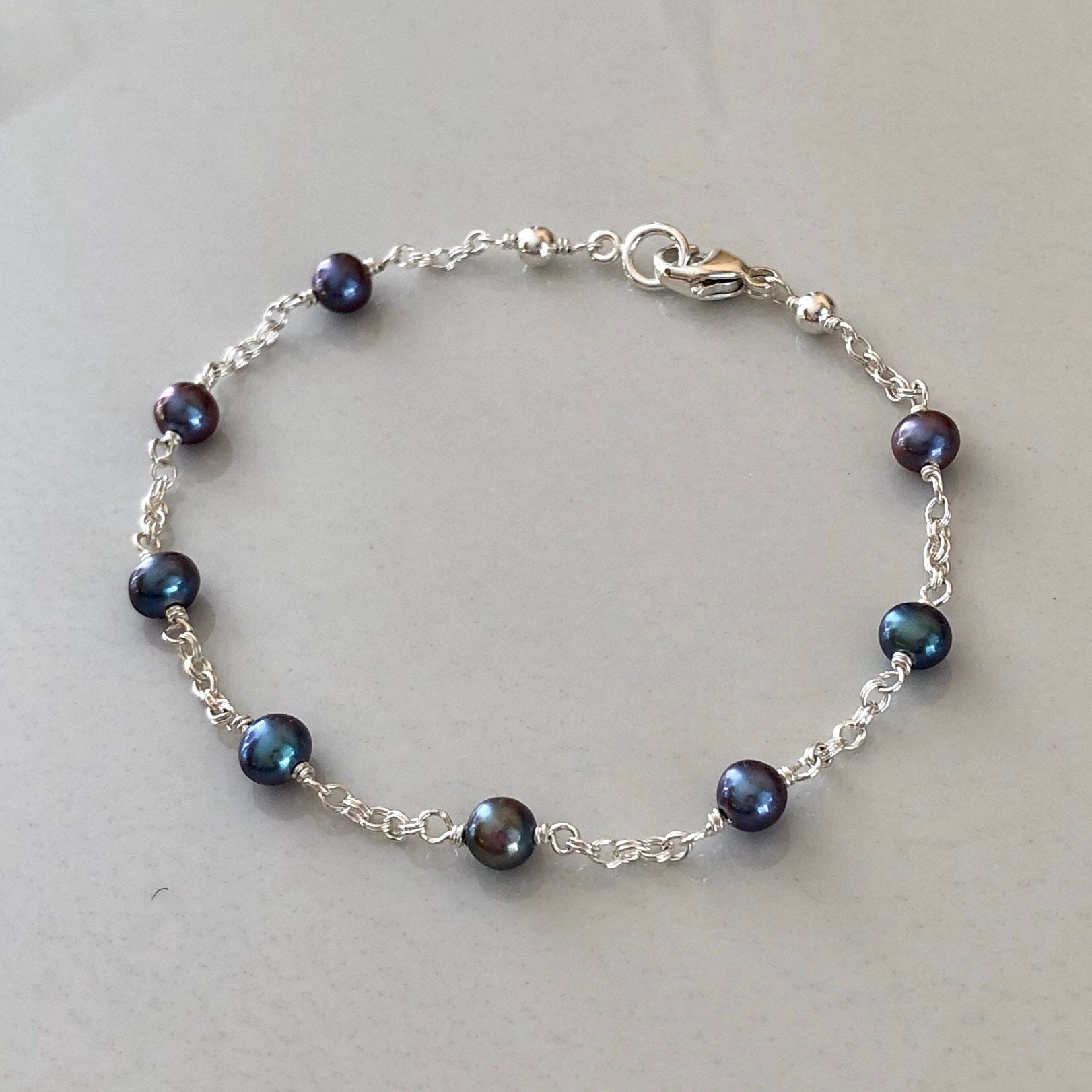 【BLACKPURPLE】Yeriel Pearl Ball Cubic Bracelet 8.5-9.0 mm AAA Black Freshwater Pearl Bracelet – Pearl Paradise