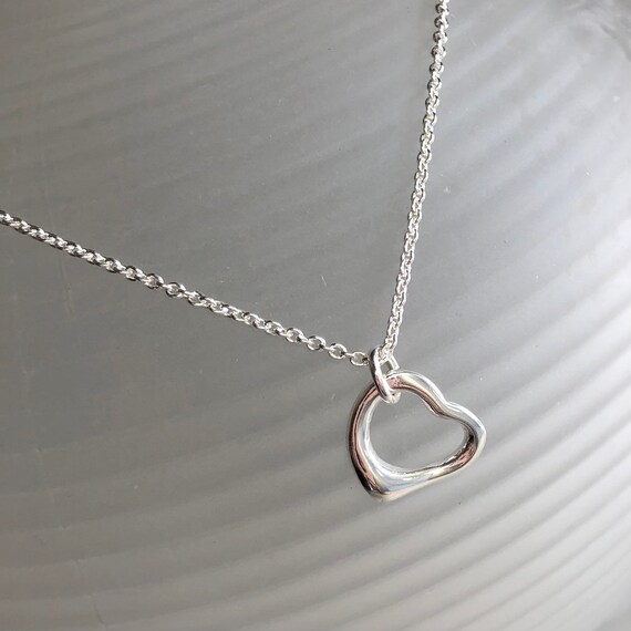 Sterling Silver Open Heart Pendant With Floating Zirconia – Simon Curwood  Jewellers