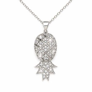 May include: A silver-toned necklace featuring a pineapple-shaped pendant. The pendant is entirely encrusted with small, clear, sparkling stones arranged in a grid pattern, with a pointed leaf design at the base, suspended from a delicate chain.