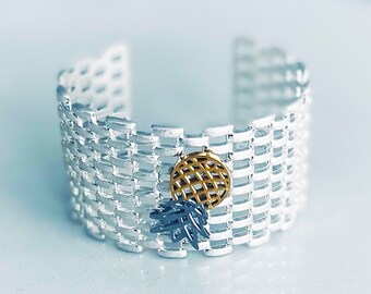 Silver Metal Cuff Bracelet with Upside Down Pineapple Symbol; Pineapple Jewelry