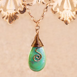 Turquoise Czech Glass Teardrop Pendant with a Silver Travertine finish Wire Wrapped in Antique Copper and hung from an Antique Copper Chain
