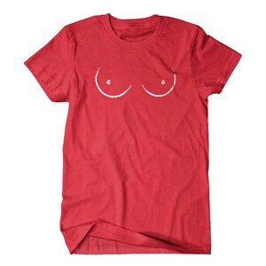 May include: Red t-shirt with a white outline of two breasts on the front.