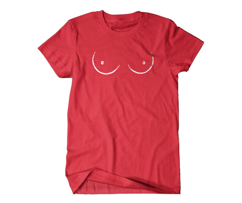 May include: Red t-shirt with a white outline of two breasts on the front.