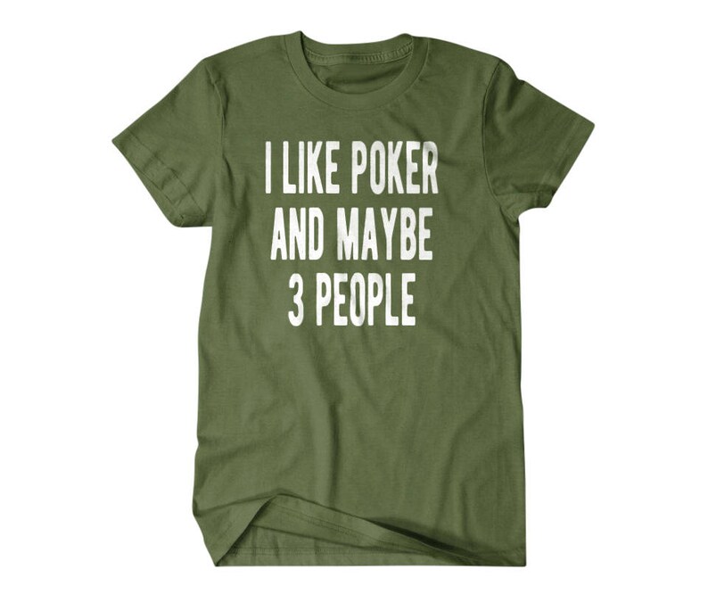 May include: A green t-shirt with the text "I like poker and maybe 3 people" printed in white.