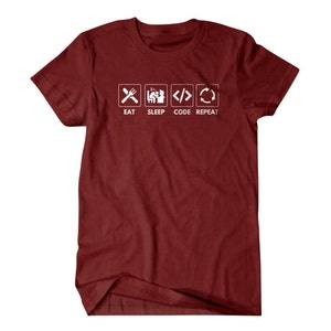 May include: Burgundy t-shirt with white text that reads "Eat Sleep Code Repeat" with icons representing each word.